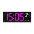 Electronic LED alarm clock with large digital display showing time and temperature, in acrylic blue and white colour.