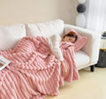 Soft Wind bubble velvet faux rabbit fur blanket in caramel colour showing double-sided texture