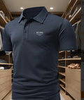 Men's loose fit short-sleeved polo shirt with a lapel collar in a solid colour.