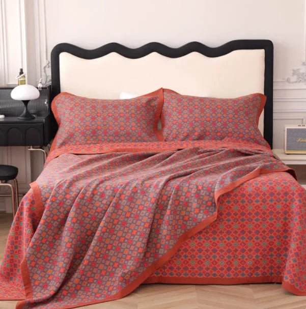 Three-piece cotton gauze bedding set with floral pattern blanket and matching pillowcases