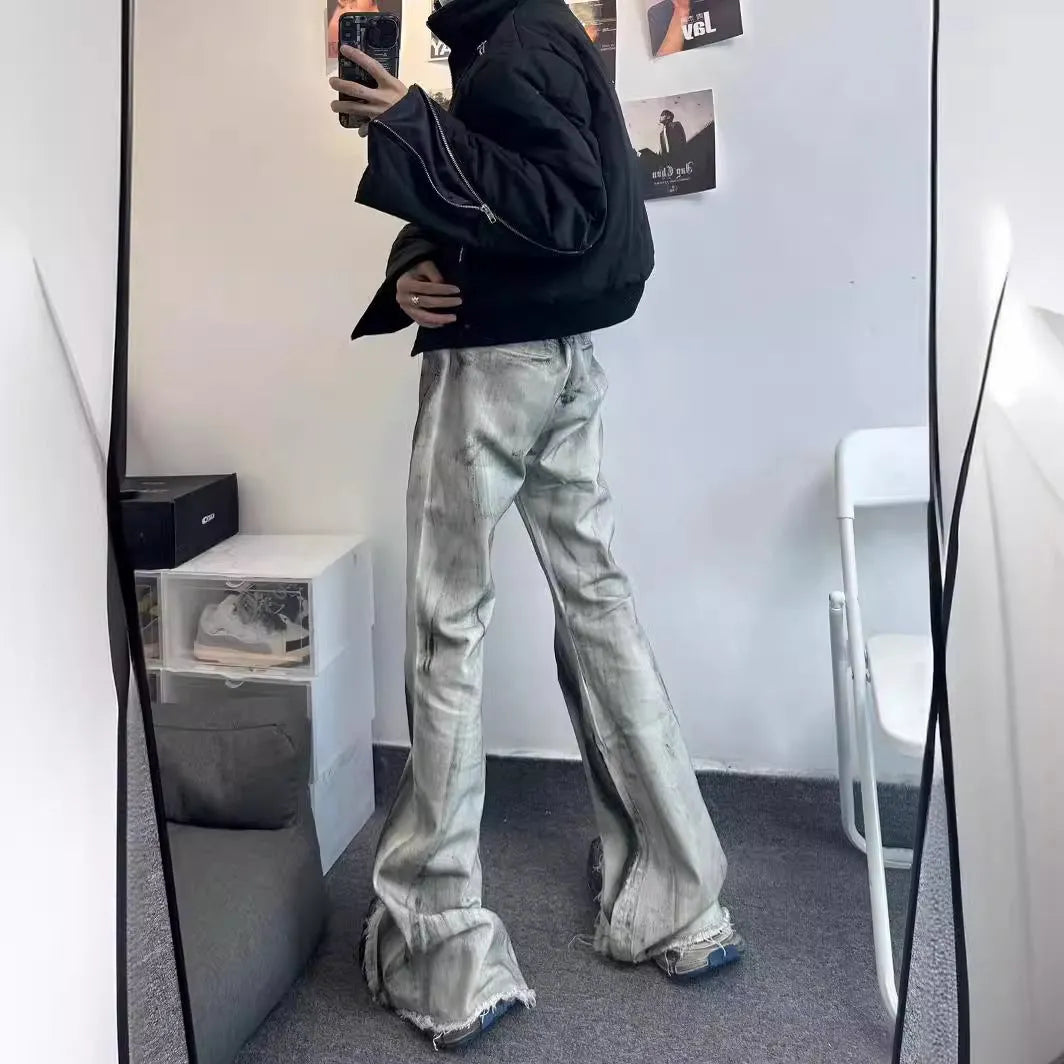 White jeans with black ribbon gradient detailing and heavy selvedge denim construction
