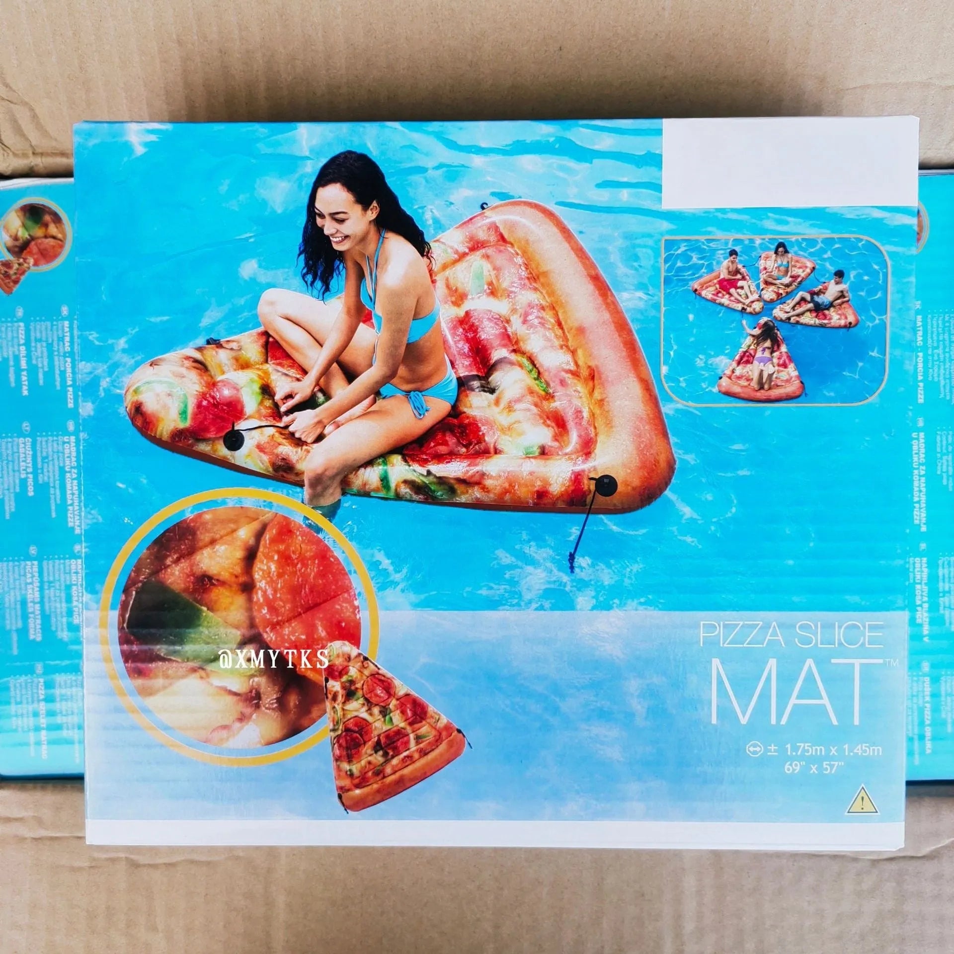 Large green inflatable pizza surfboard shaped recliner float on water