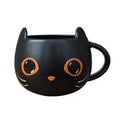 Black ceramic cat-shaped couple mug with pumpkin cover and 355ml capacity.