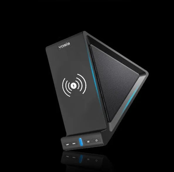 Black multifunctional Bluetooth speaker with integrated wireless charging pad and phone stand.