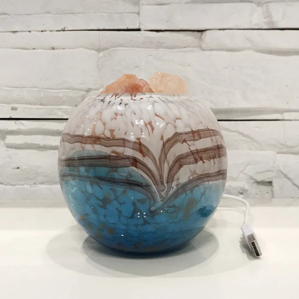Hand-blown lead-free glass night light with USB cable, 13cm height, on a bedside table