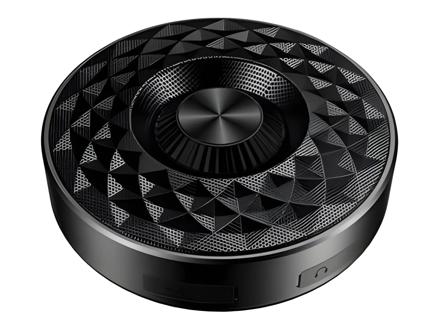 Compact black, orange, and silvery white portable Bluetooth speaker on a table