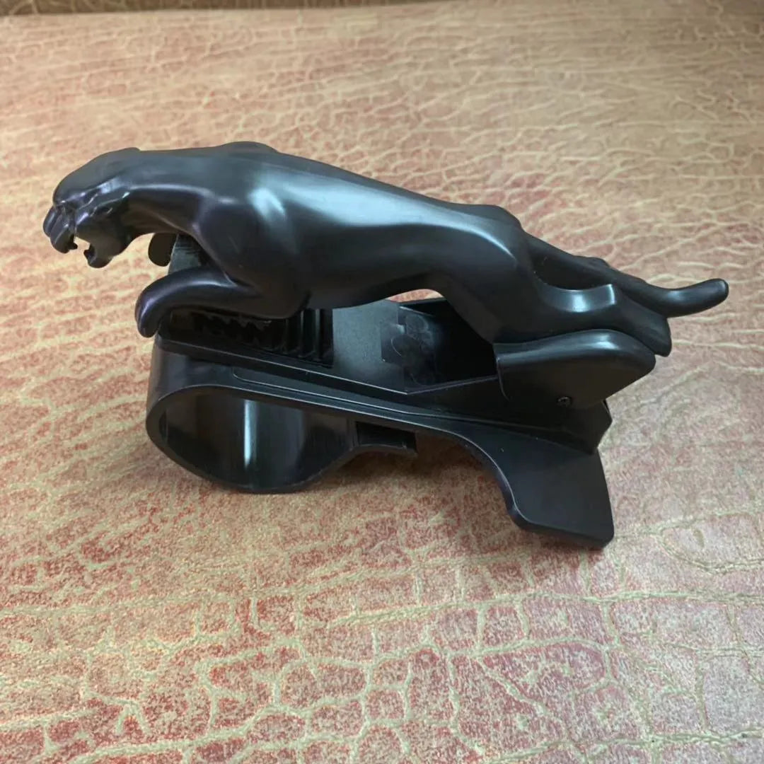 Rotatable car mobile phone holder in black, gold, and silver finishes made from ABS plastic.