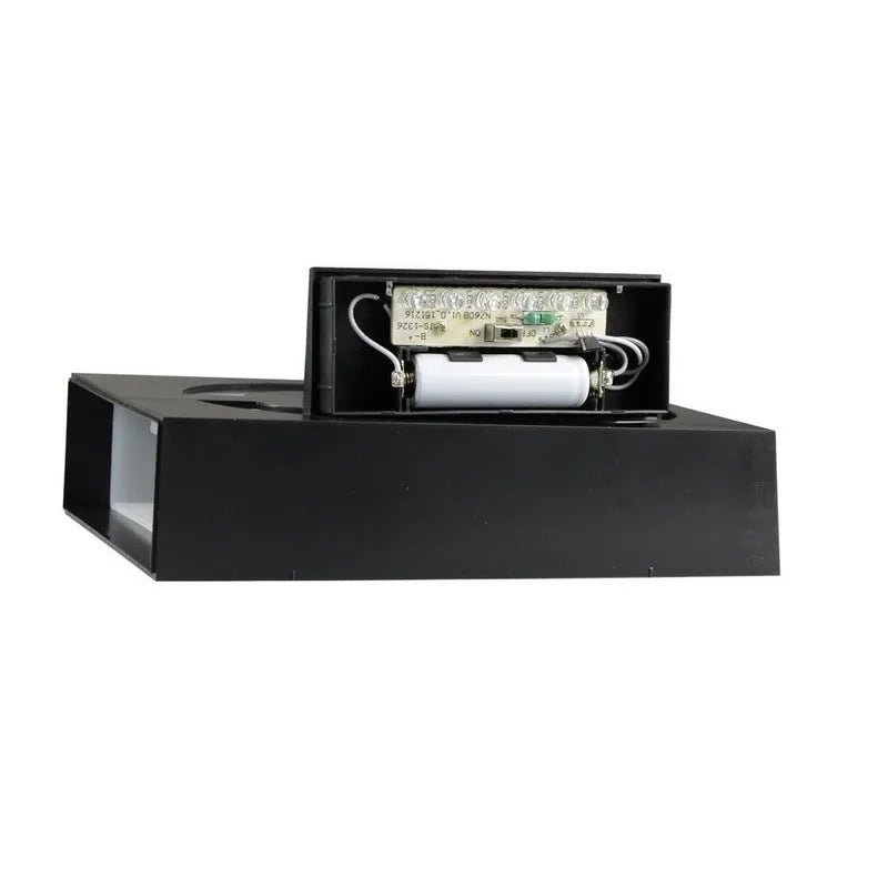 Solar powered LED illuminated house number plate with white digits, for outdoor wall mounting.