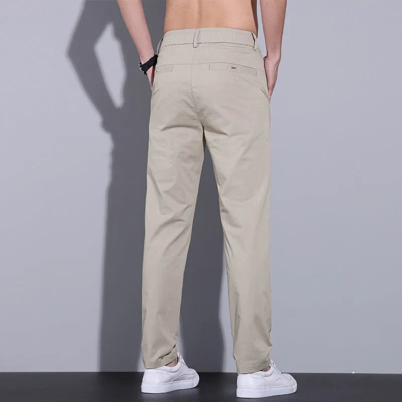 Men's straight slim-fit cotton trousers in light khaki colour with micro-elastic fabric for spring and summer wear