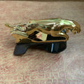 Rotatable car mobile phone holder in black, gold, and silver finishes made from ABS plastic.
