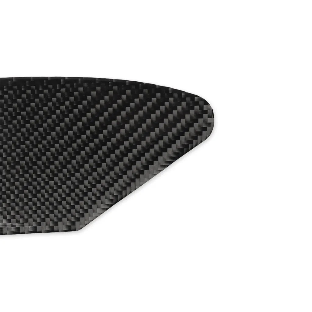 Carbon fibre USB charging port decorative sticker with 3M adhesive backing.