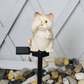 Brown resin cat-shaped solar garden light with LED, for courtyard decoration.