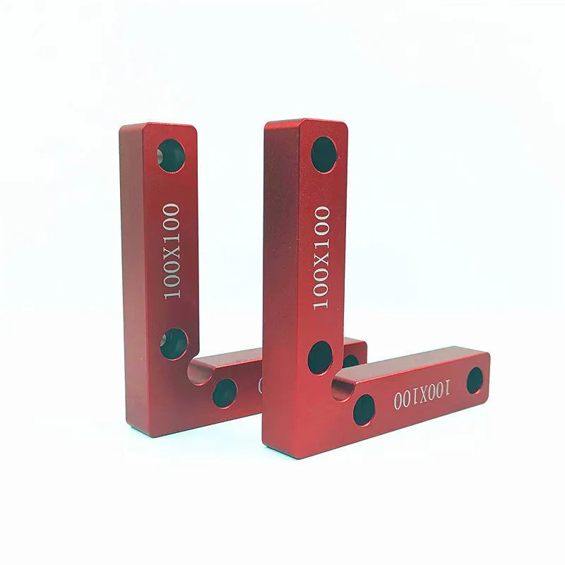 Aluminium right angle positioning block for woodworking jigsaw on a workbench.