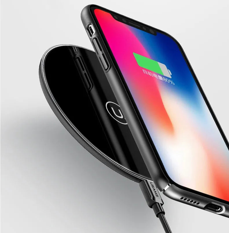 Glass disc wireless charger showing black and white colour options with charging indicator