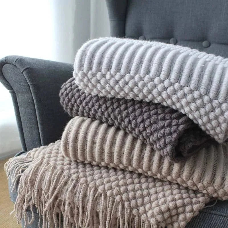 Polyester fibre small throw blanket in dark grey, khaki, or light grey, showing its 127x170cm size.