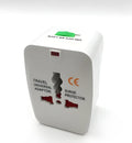White universal travel plug adapter showing pins, sized at 73 by 50 by 39 millimetres.