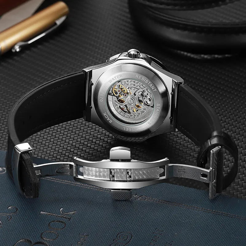 Automatic men's watch with skeleton diamond movement and white case, shown on wrist.