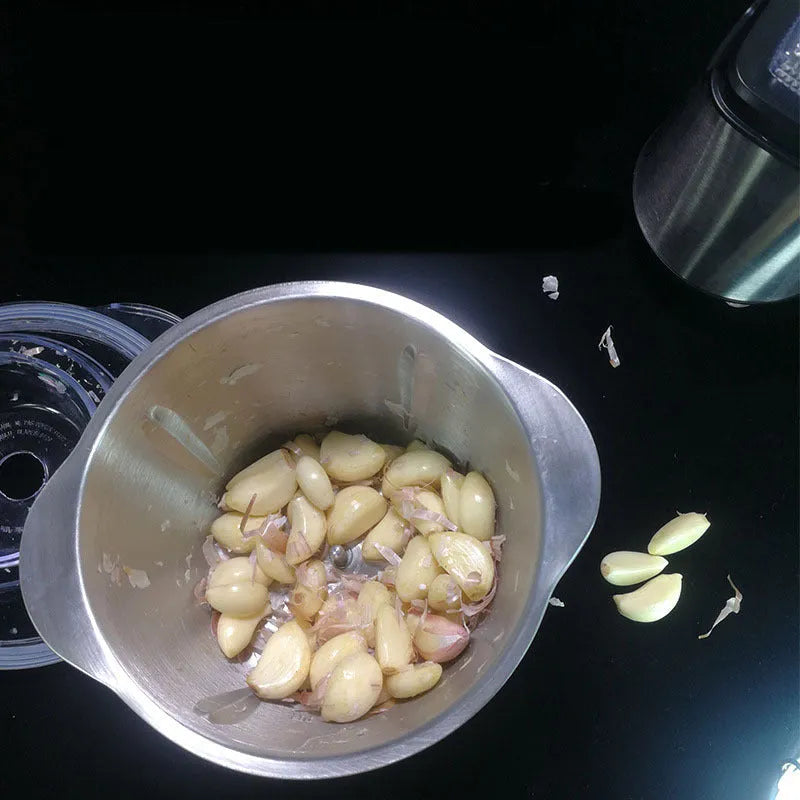 Electric garlic peeler and LONG PLUS meat grinder kitchen appliance on a countertop