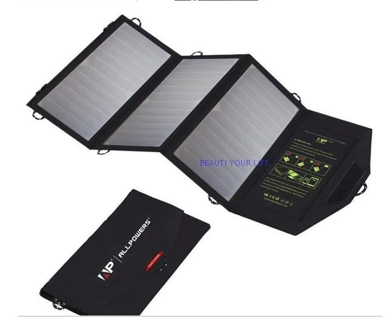 Black foldable solar panel charger with dual USB ports and mounting loops for backpacks