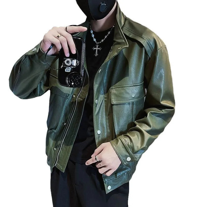 Man wearing a black PU leather pilot-style jacket with side pockets and a straight hem.