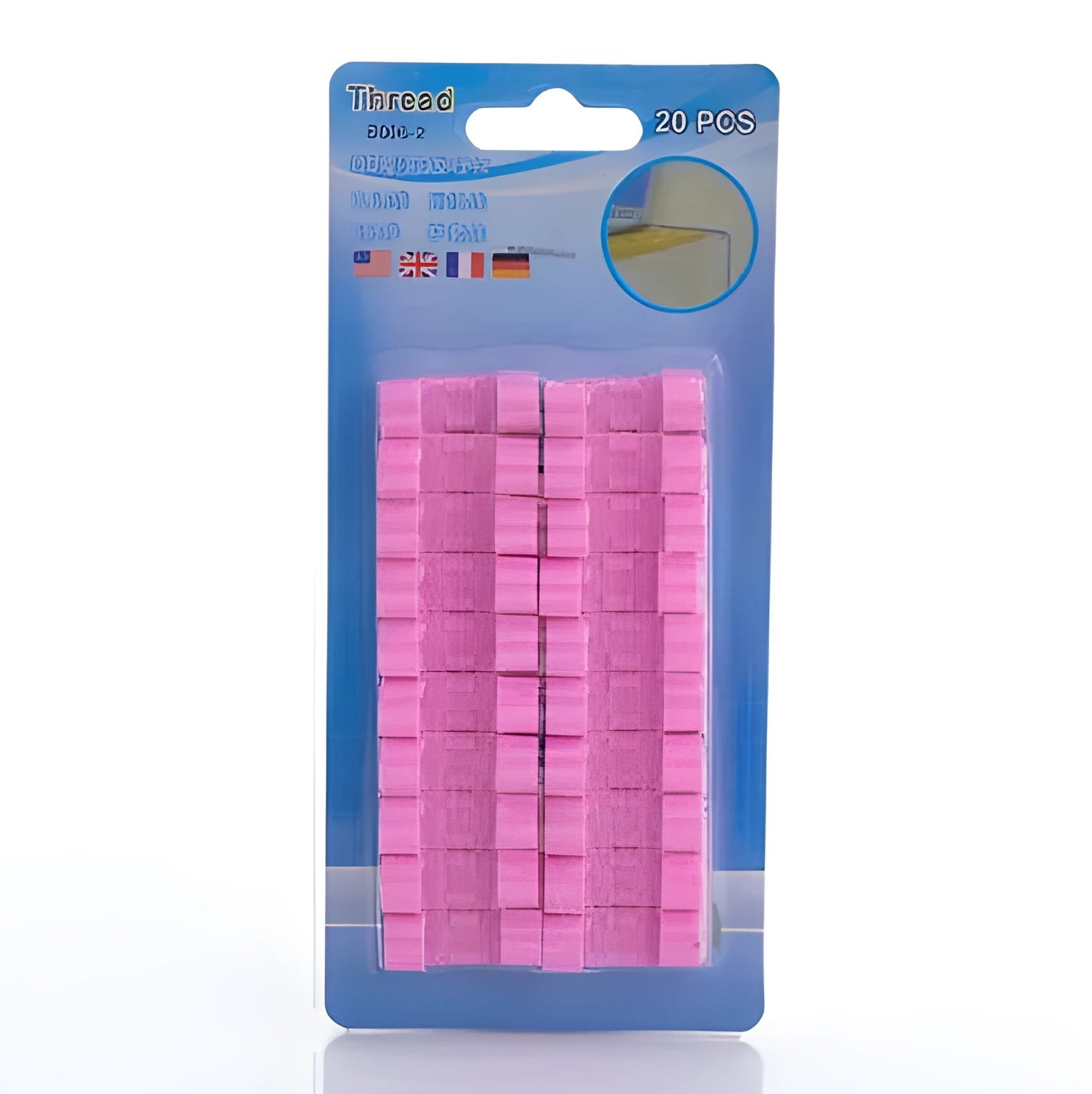 Self-adhesive wire cable organizer clips kit in various colours with mesh bundling device on a desk.