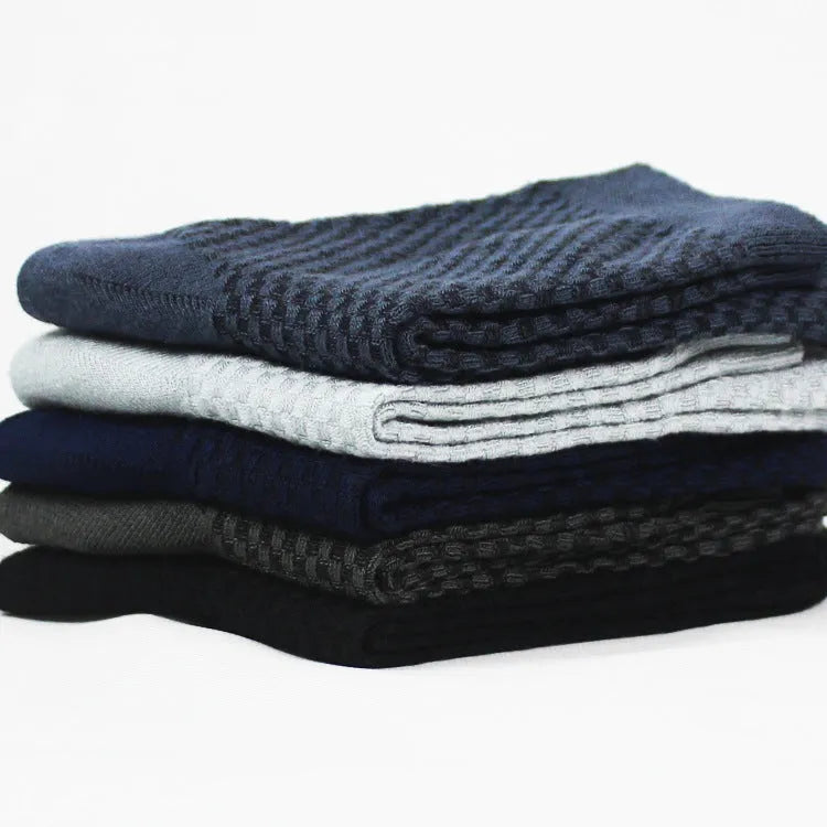 A pair of men's bamboo fibre socks in a classic colour, showing the small square pattern and medium thickness.