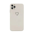 Silicone phone case for Apple iPhone in multiple solid colour options including black, pink, and purple