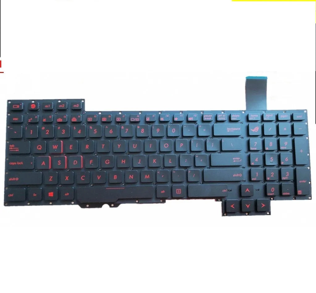 Black wired PS/2 keyboard with multimedia keys on a desk.