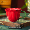 Ceramic breakfast cup with floral pattern, 500ml capacity, in red or purple.