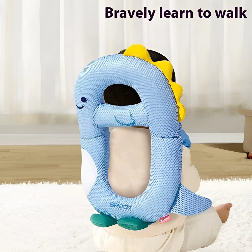 Baby wearing cartoon dinosaur anti-collision pillow for toddler fall protection