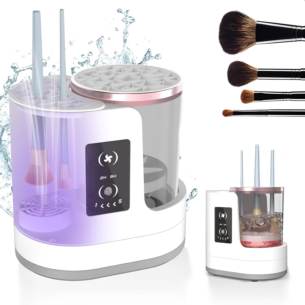 White electric makeup brush cleaner with drying chamber on a table, next to makeup brushes.