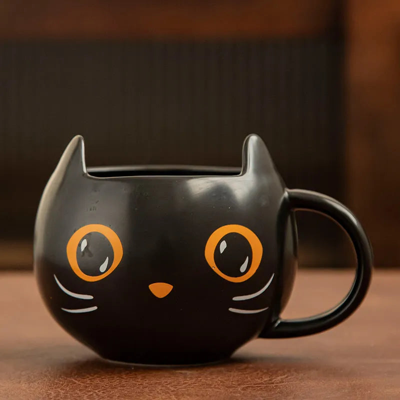 Black ceramic cat-shaped couple mug with pumpkin cover and 355ml capacity.