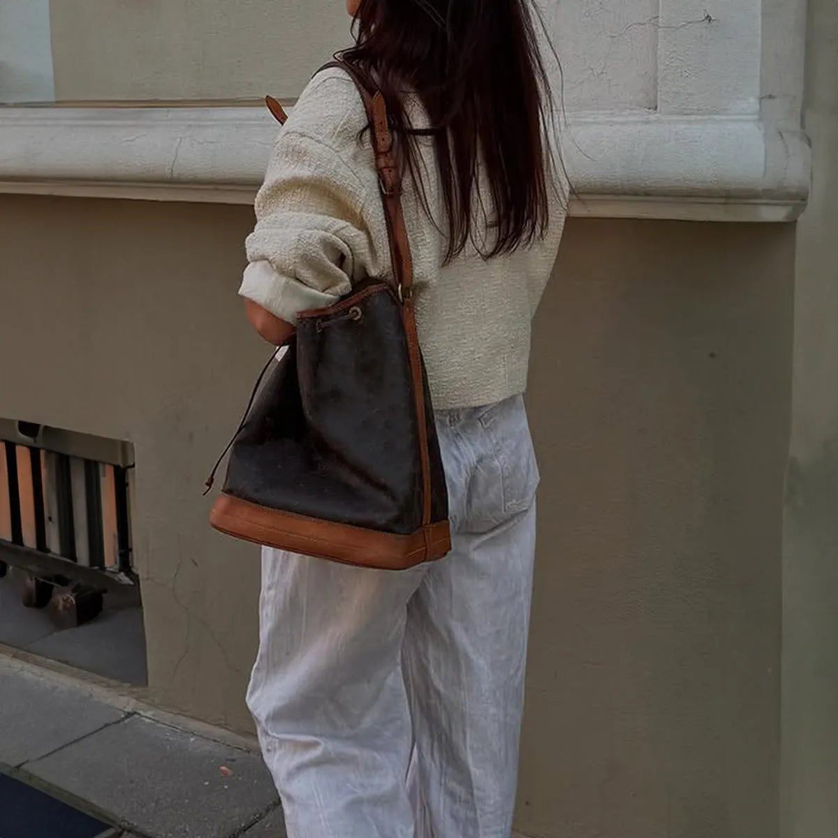 Women's apricot solid colour polyester long sleeve jacket, front view, on hanger