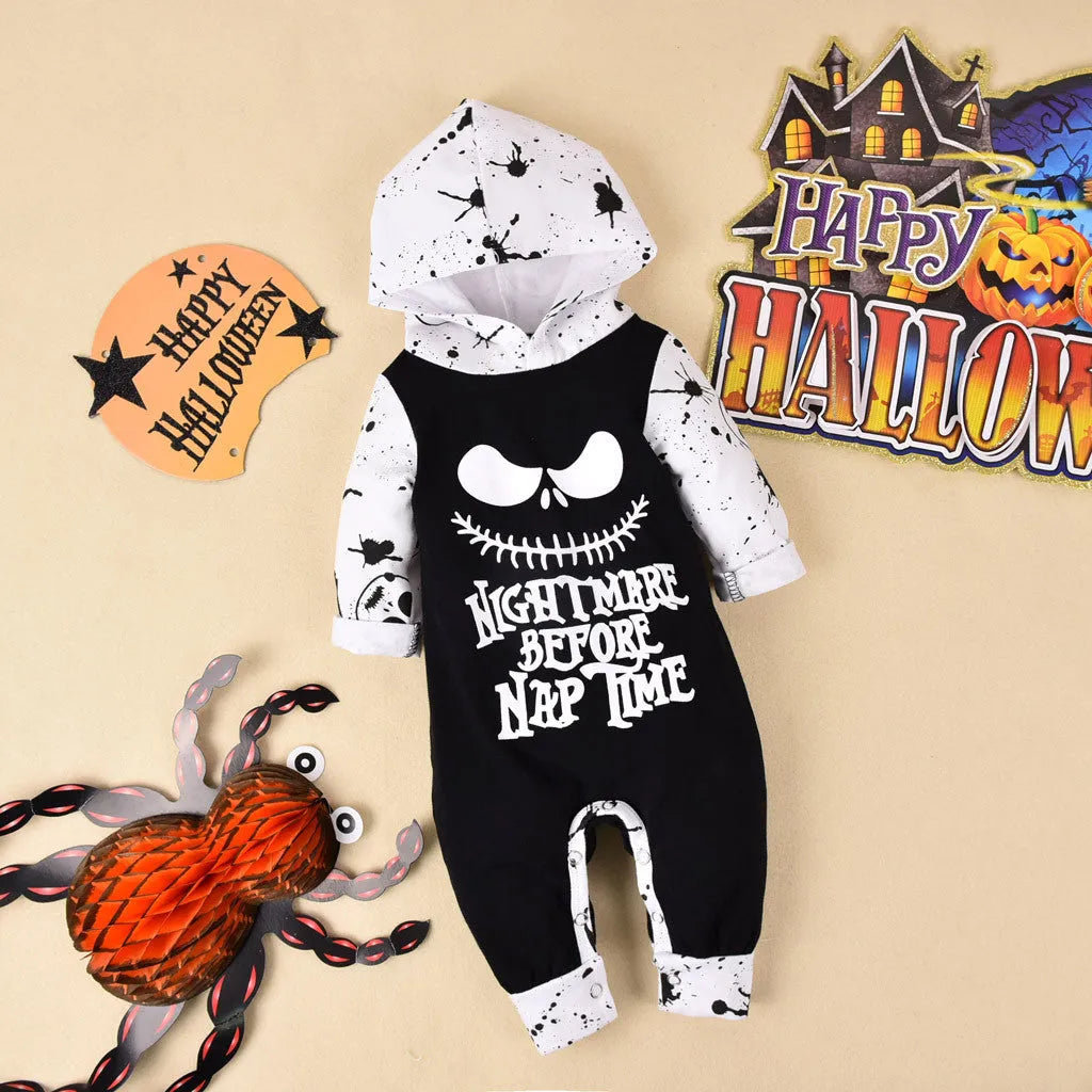 Black hooded long sleeve cotton Halloween romper for a child on a hanger.