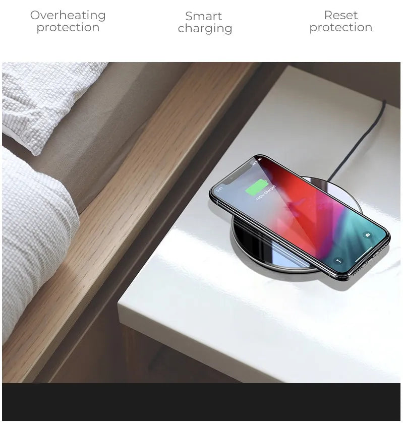 Black QI wireless charging pad with smooth surface and silicone non-slip base for 15W fast charging