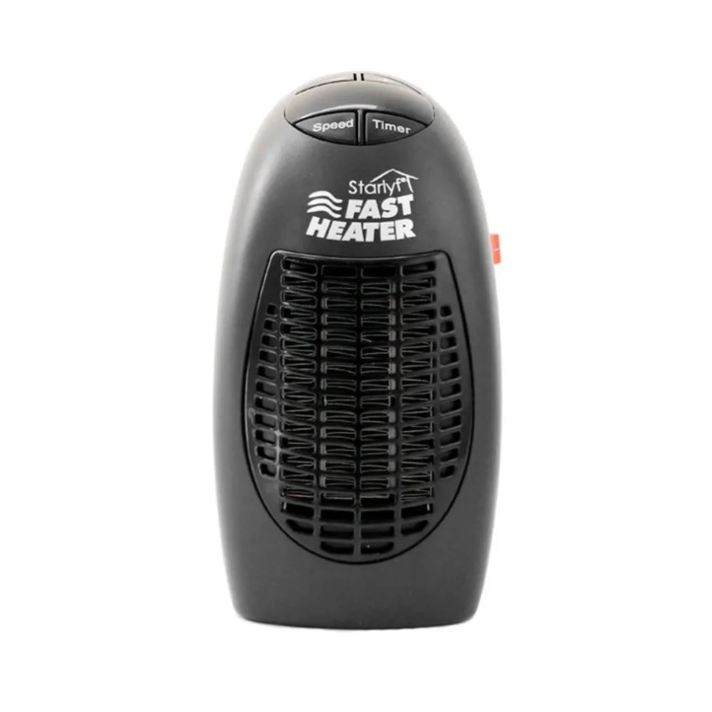 Black mini electric heater with digital display and a rotating plug on a table.