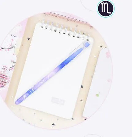 Box containing 12 constellation-themed quick-drying gel pens with plastic barrels