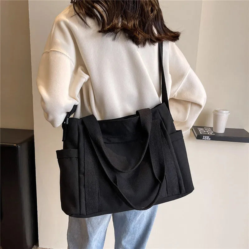 Large capacity polyester canvas shoulder tote bag with external pocket and phone compartment
