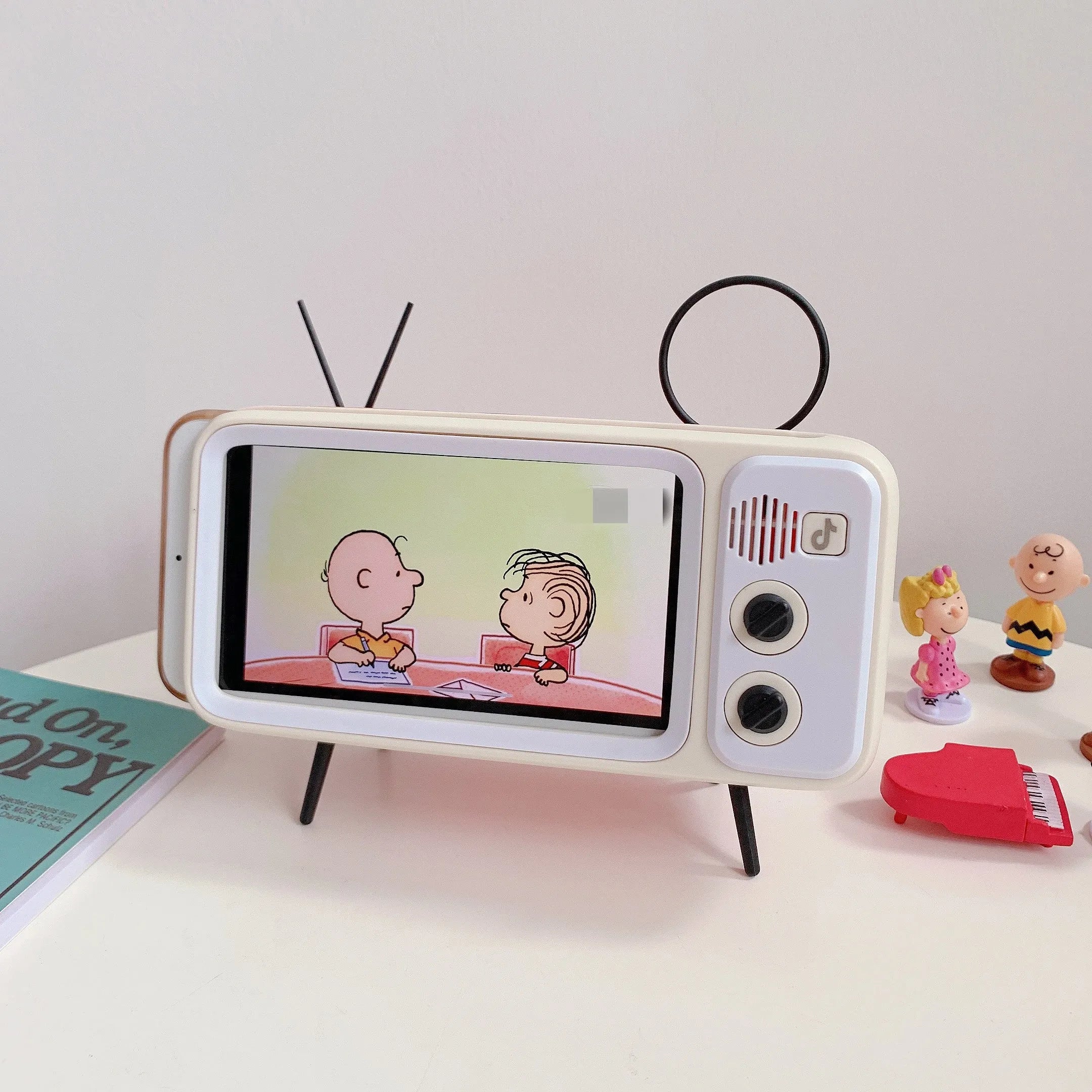 Vintage wooden TV Retro phone stand with built-in speaker, Bluetooth connectivity, and phone placed on top