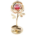 Gold artificial rose with diamond accent decoration on display