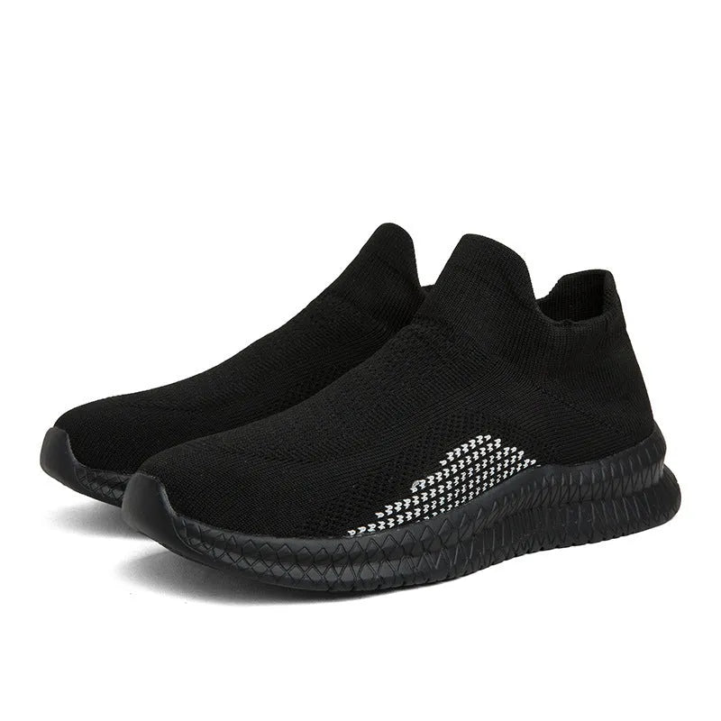 Men's white Popcorn Flyknit low-top casual sneaker on a solid background.