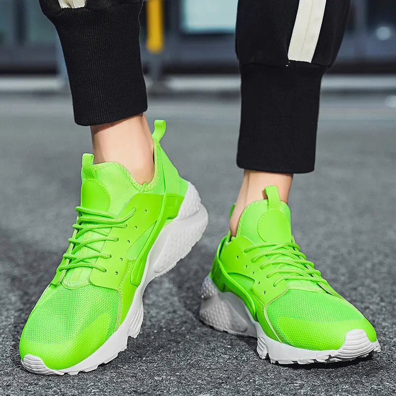 Men's low-top casual shoes in fluorescent colour with mesh upper and cross shoulder straps
