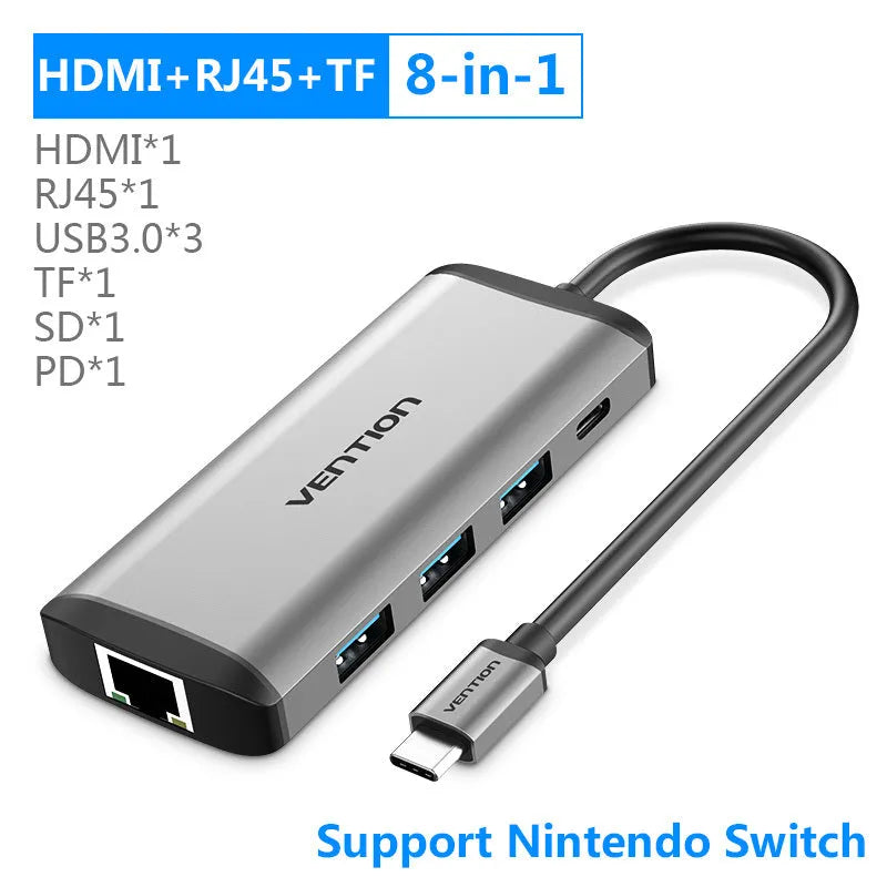 Deep grey USB-C multi-port hub with HDMI, USB, Ethernet, and memory card slots on a 0.15m cable.