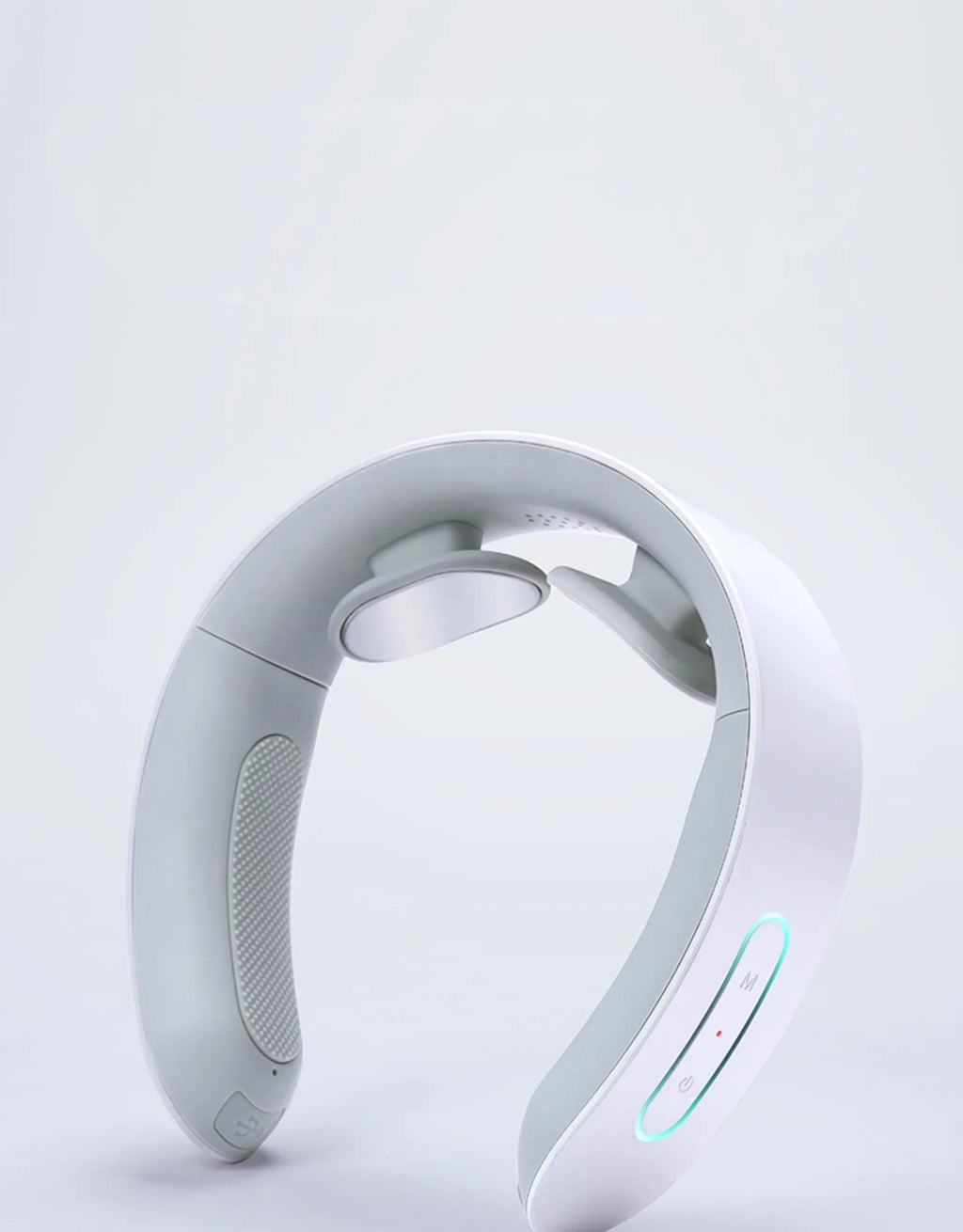 White electric acupressure massager for back neck and shoulder pain relief with control buttons.