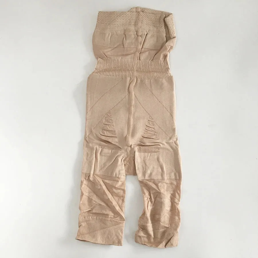 Women's black seamless high waist shapewear shorts laid flat on a white background.