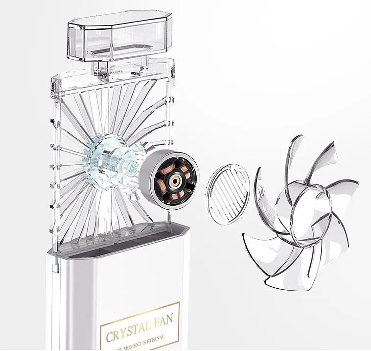 Pink portable rechargeable perfume fan with essential oil diffuser and USB charging port.