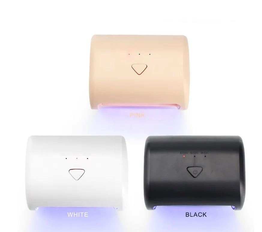 9W black LED UV nail lamp with dual light source and timer buttons on a white surface