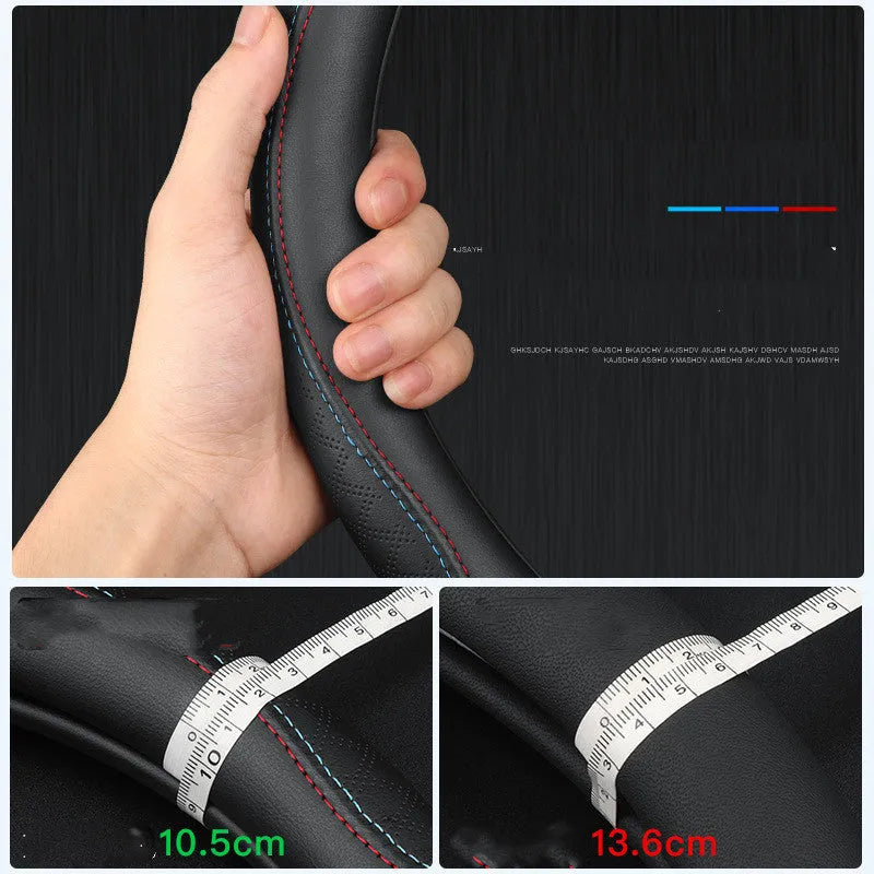 Black steering wheel cover with two-colour stitching, showing napa leather texture and a 38cm diameter.