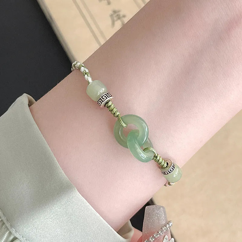 Green copper ethnic bracelet with a peace buckle and jade double rings, animal Zodiac modelling.