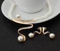 Gold electroplated pearl necklace and earrings suite with drop-shaped pendants and deep V clavicle design